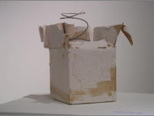 GIFT BOING, 4.25 x 4.25 x 6.5 - Cardboard, wallpaper, wood, bedspring, wax